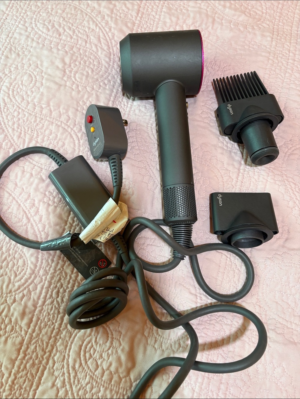 Dyson hair dryer in fuchsia pink and dark gray with attachments - Picture 3 of 7